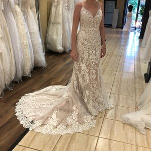 Madison James wedding dress size 8. Professionally cleaned. No rips tears stain